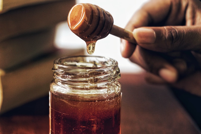 Honey Photo by Arwin Neil Baichoo on Unsplash